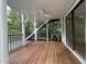 View from screened porch with a ceiling fan and stairs leading to yard at 3412 Rock Creek Dr, Raleigh, NC 27609