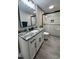 Updated bathroom featuring modern vanity with granite countertop and glass-enclosed shower at 3588 Northern Hills Dr, Rocky Mount, NC 27804