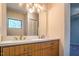 Bathroom featuring a double sink vanity with modern fixtures at 4100 Five Oaks Dr # 50, Durham, NC 27707