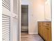 Bathroom with a modern vanity and wood-look vinyl flooring at 4100 Five Oaks Dr # 50, Durham, NC 27707