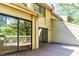 Exterior view of a home with a deck and large sliding glass doors at 4100 Five Oaks Dr # 50, Durham, NC 27707