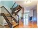 Bright living room featuring hardwood floors, fireplace, and sliding glass doors to the outdoor at 4100 Five Oaks Dr # 50, Durham, NC 27707