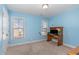Study area with a wooden desk and two large windows that provide natural light at 4204 Vineyard Ridge Dr, Zebulon, NC 27597