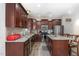 Spacious kitchen showcasing stainless steel appliances, granite countertops, and a functional center island at 4204 Vineyard Ridge Dr, Zebulon, NC 27597