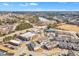 A drone shot of the community near a highway, a pond and business buildings at 507 Gateway Townes Blvd, Wake Forest, NC 27587