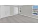 A light and airy bedroom with two windows and two closets offers comfort and ample storage space at 507 Gateway Townes Blvd, Wake Forest, NC 27587