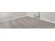 Neutral carpet in a bedroom showcasing clean, minimalist design, brightened by natural light at 507 Gateway Townes Blvd, Wake Forest, NC 27587