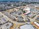 An aerial shot of a townhome community with surrounding businesses and parking lots at 507 Gateway Townes Blvd, Wake Forest, NC 27587