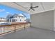 Expansive covered deck ideal for relaxing and entertaining outdoors, with neighborhood views at 507 Gateway Townes Blvd, Wake Forest, NC 27587