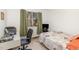 Bedroom with a window view, carpet flooring, and neutral-toned walls at 5848 Yates Mill Pond Rd, Raleigh, NC 27606