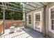 Inviting back deck featuring a pergola with string lights and comfortable outdoor seating at 5915 Eaglesfield Dr, Raleigh, NC 27613