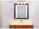 Bathroom featuring a mirror above a vanity and a vintage-inspired sink at 5915 Eaglesfield Dr, Raleigh, NC 27613