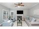 Comfortable living room featuring a fireplace and an open layout at 5915 Eaglesfield Dr, Raleigh, NC 27613