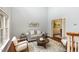 Cozy living room with hardwood floors and neutral walls at 5915 Eaglesfield Dr, Raleigh, NC 27613