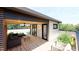 Comfortable rooftop deck featuring wood flooring, a ceiling fan, outdoor furniture, and garden views at 615 Velma Hopkins Ln, Raleigh, NC 27603