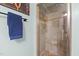 Shower room boasts tiled walls, a glass door and brushed chrome fixtures at 6404 Dixon Dr, Raleigh, NC 27609