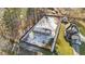 Aerial shot of home, revealing a large, fenced backyard and neighborhood surroundings at 7103 Big Horn Dr, Hillsborough, NC 27278