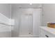 Modern bathroom featuring a tiled shower with a white shower curtain and vanity at 7103 Big Horn Dr, Hillsborough, NC 27278