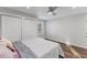 Cozy bedroom with natural light, large closet, and beautiful hardwood flooring at 7103 Big Horn Dr, Hillsborough, NC 27278