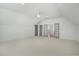 Bright bedroom featuring neutral carpet and a ceiling fan at 7112 Camp Side Ct, Raleigh, NC 27613