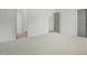 Bedroom with neutral walls and carpeted flooring with views to bath at 7112 Camp Side Ct, Raleigh, NC 27613