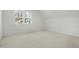Bright bedroom featuring a window providing ample natural light at 7112 Camp Side Ct, Raleigh, NC 27613