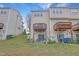 Exterior backyard with a deck, patio furniture, and well-maintained lawn at 714 Cupola Dr, Raleigh, NC 27603