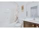Clean bathroom showcasing a tub-shower combo, sleek vanity, and neutral decor at 714 Cupola Dr, Raleigh, NC 27603