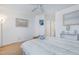 Clean and well-lit bedroom with a large bed, soft carpet, and coordinated decor at 714 Cupola Dr, Raleigh, NC 27603