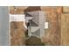 An overhead shot captures a two-story home featuring a concrete patio and meticulous landscaping at 714 Fairway Dr, Mebane, NC 27302