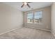 Neutral bedroom with cozy carpet and a ceiling fan fixture at 714 Fairway Dr, Mebane, NC 27302