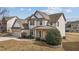 Attractive two-story home with a well-maintained lawn, complemented by lush bushes at 714 Fairway Dr, Mebane, NC 27302