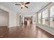 Open-concept area featuring hardwood floors and natural light and a partial kitchen view at 714 Fairway Dr, Mebane, NC 27302