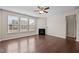 Bright living area with fireplace and large windows offering neighborhood views at 714 Fairway Dr, Mebane, NC 27302