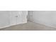 Bedroom with neutral carpet, double-door closet, and white trim providing ample storage space at 7521 Percussion Dr, Apex, NC 27539