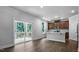 Modern kitchen with stainless steel appliances, and a center island at 7521 Percussion Dr, Apex, NC 27539