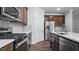 Beautiful kitchen featuring stainless steel appliances, and granite countertops at 7521 Percussion Dr, Apex, NC 27539