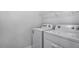 Laundry room showcasing a new washer and dryer at 7521 Percussion Dr, Apex, NC 27539