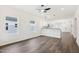 Inviting living area with a view of kitchen and a ceiling fan at 815 Graham St, Burlington, NC 27217