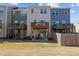 Townhome backyard view with patios and decks at 905 Arnold Place Dr, Fuquay Varina, NC 27526