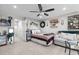 Cozy bedroom featuring neutral tones, plush bedding, and comfortable sitting area at 905 Arnold Place Dr, Fuquay Varina, NC 27526