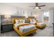 A playful ' bedroom with two twin beds, colorful robot-themed decor, and a ceiling fan at 1003 Freestone Rd, Durham, NC 27703