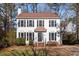 Charming two-story home with a classic design, featuring a well-manicured front yard at 105 Solstice Cir, Cary, NC 27513