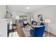 Comfortable living room featuring a fireplace, plush furniture, and a sliding glass door to the outside at 105 Solstice Cir, Cary, NC 27513