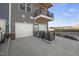 Townhome garages feature white doors and balconies above, creating a modern and practical design at 1241 S Blount Street # 201, Raleigh, NC 27601