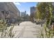 Scenic street view with a wide walkway, trees, and buildings, creating an inviting urban environment at 1241 S Blount Street # 201, Raleigh, NC 27601