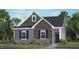 Charming two-story home with stone accents and a welcoming front porch at 1312 White Verona Way, Knightdale, NC 27545