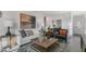 Open-concept living room featuring a modern decor, neutral walls, and lots of natural light at 1312 White Verona Way, Knightdale, NC 27545
