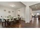 Bright dining room with wood floors, dining set and plenty of space for entertaining at 1610 Stone Rd, Durham, NC 27703