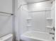 Bathroom featuring a white shower and tub combination with brushed nickel fixtures at 1749 Daiquiri Turn, Sanford, NC 27332
